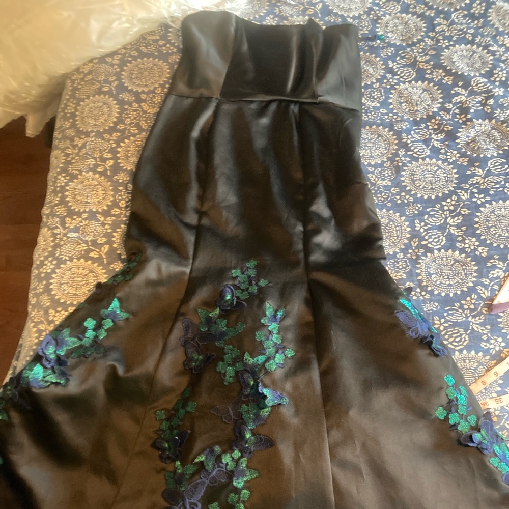 Strapless mermaid ball gown with butterfly appliqués